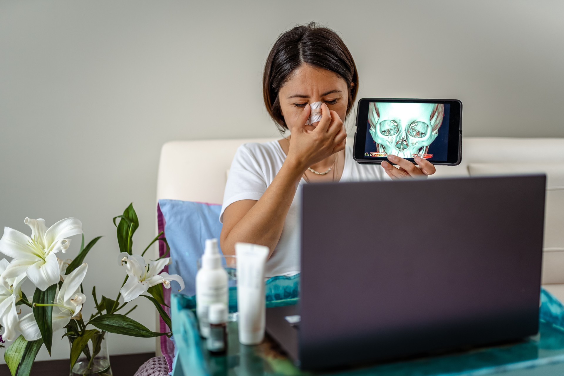 Young Woman having online consultation with her doctor in a video call