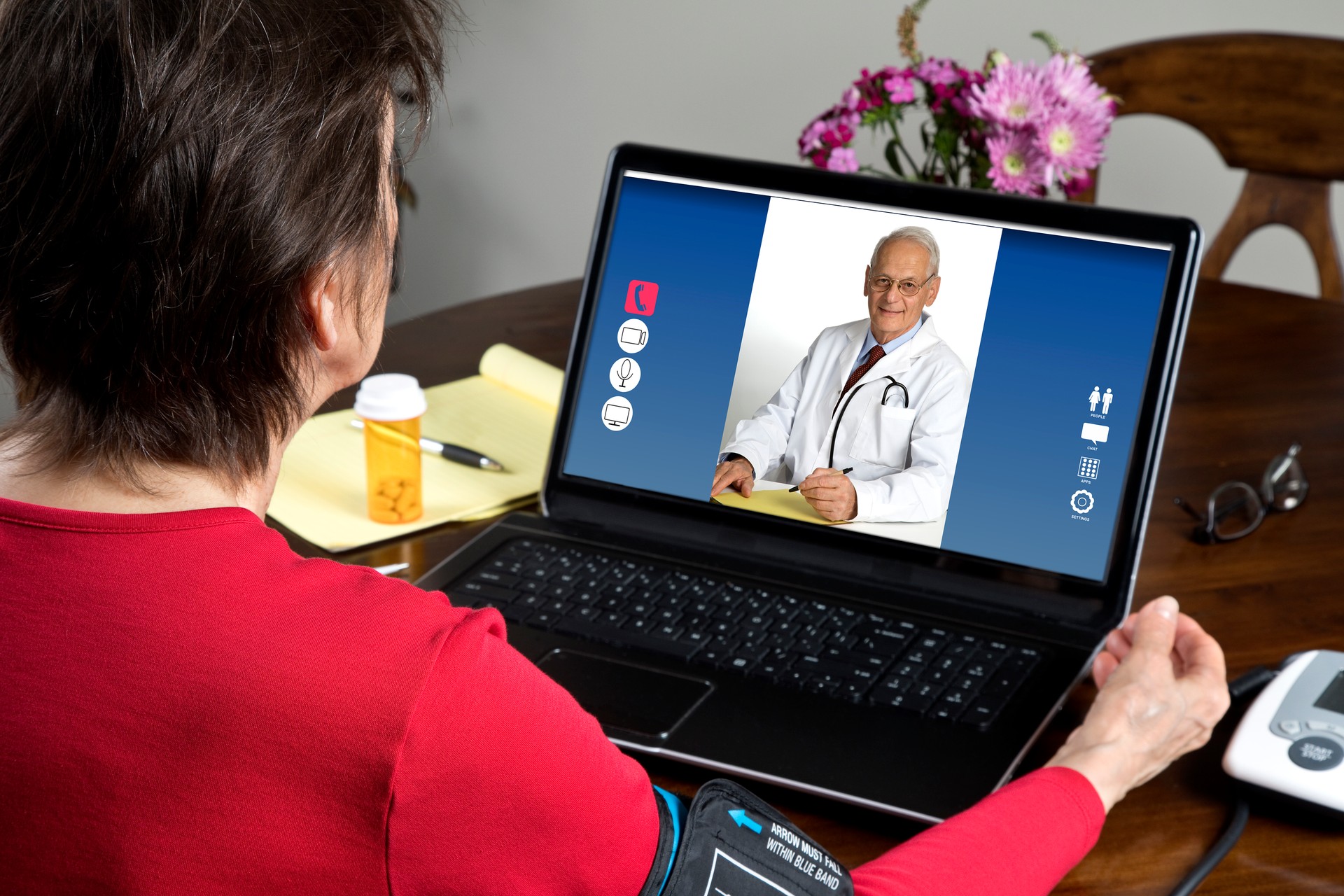 Doctor and senior woman patient, virtual meeting